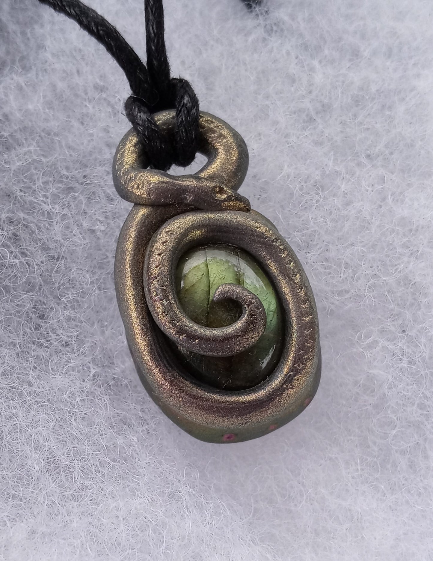 Golden egg snake necklace
